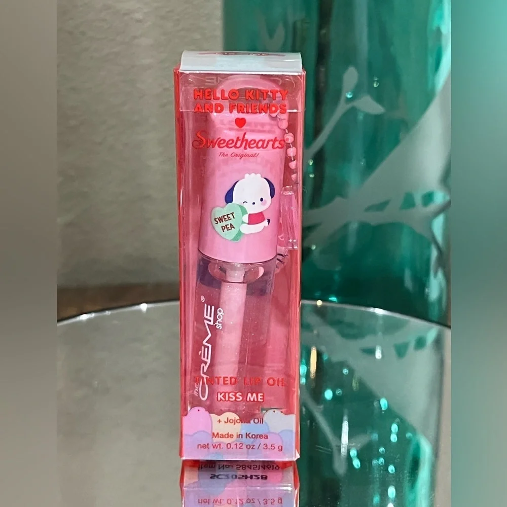 The Creme Shop x Hello Kitty Sweethearts Lip Oil in Kiss Me, new!